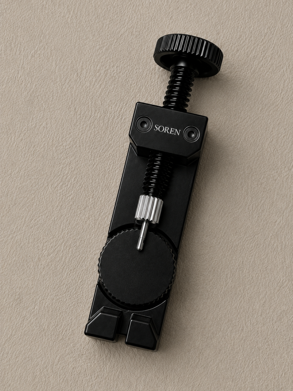 SOREN link adjustment tool side view — black aluminium frame with precision pin