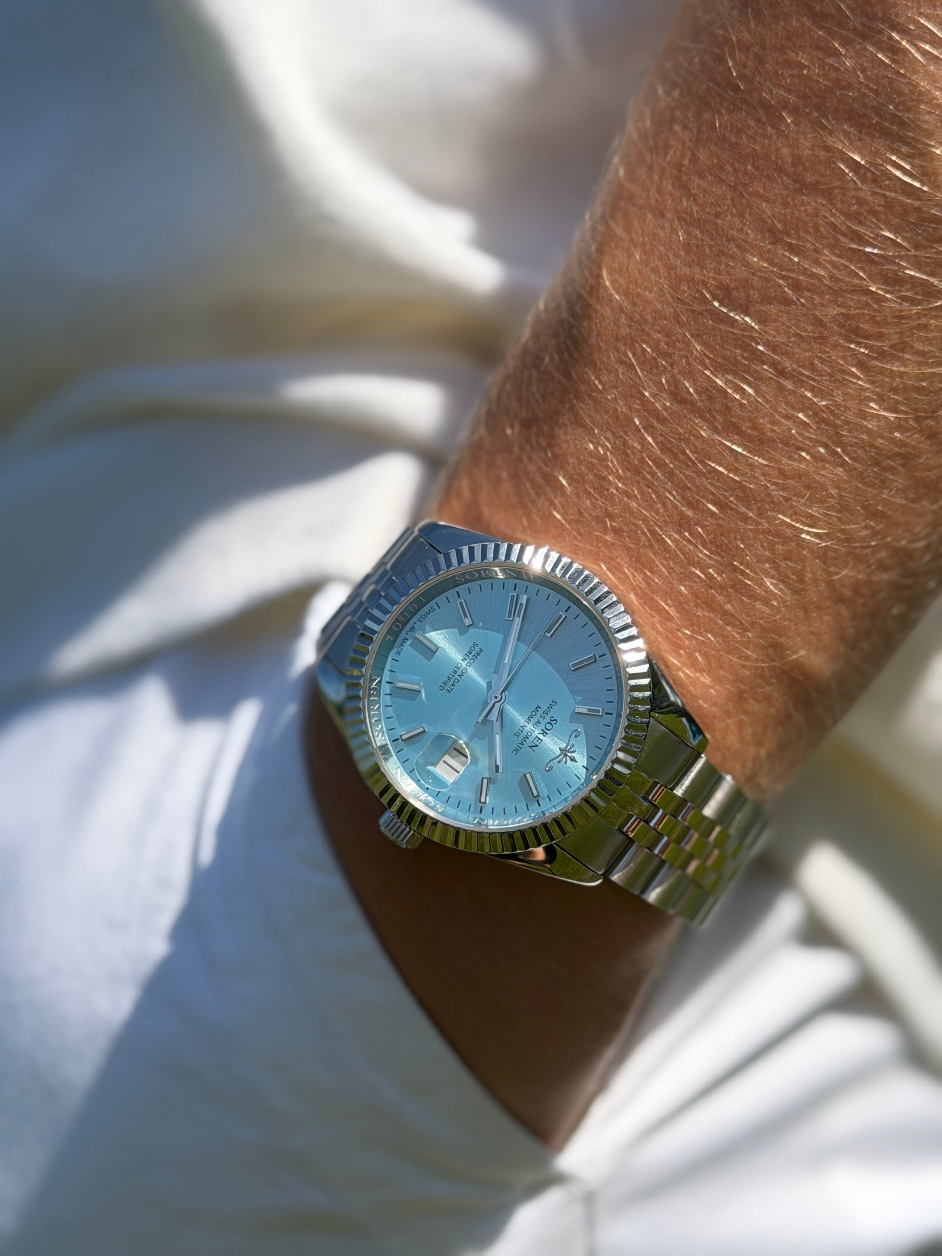 Soren Momentis Ice Blue on wrist — Swiss Made automatic, jubilee bracelet