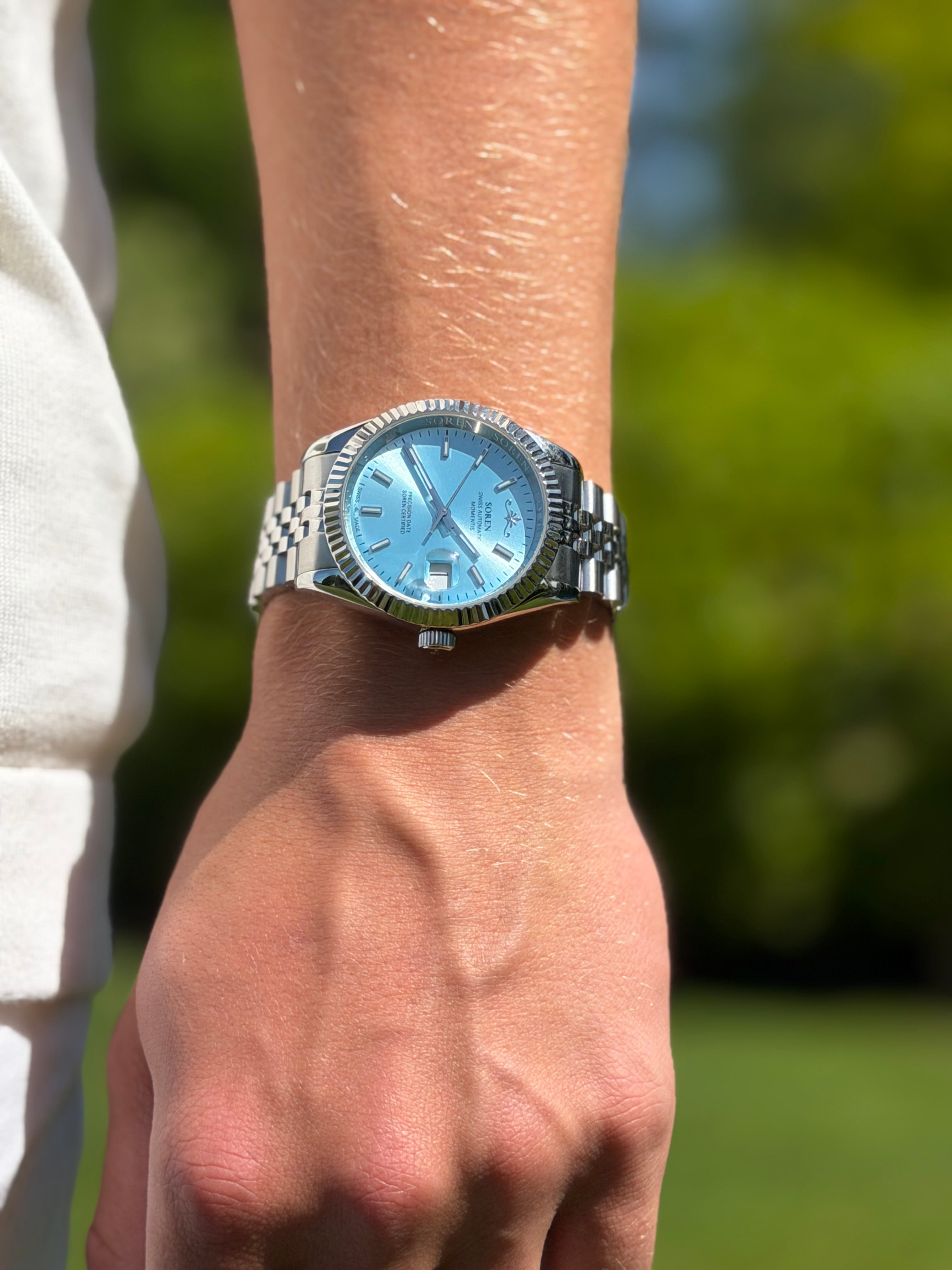 Soren Momentis Ice Blue wrist shot — jubilee bracelet detail
