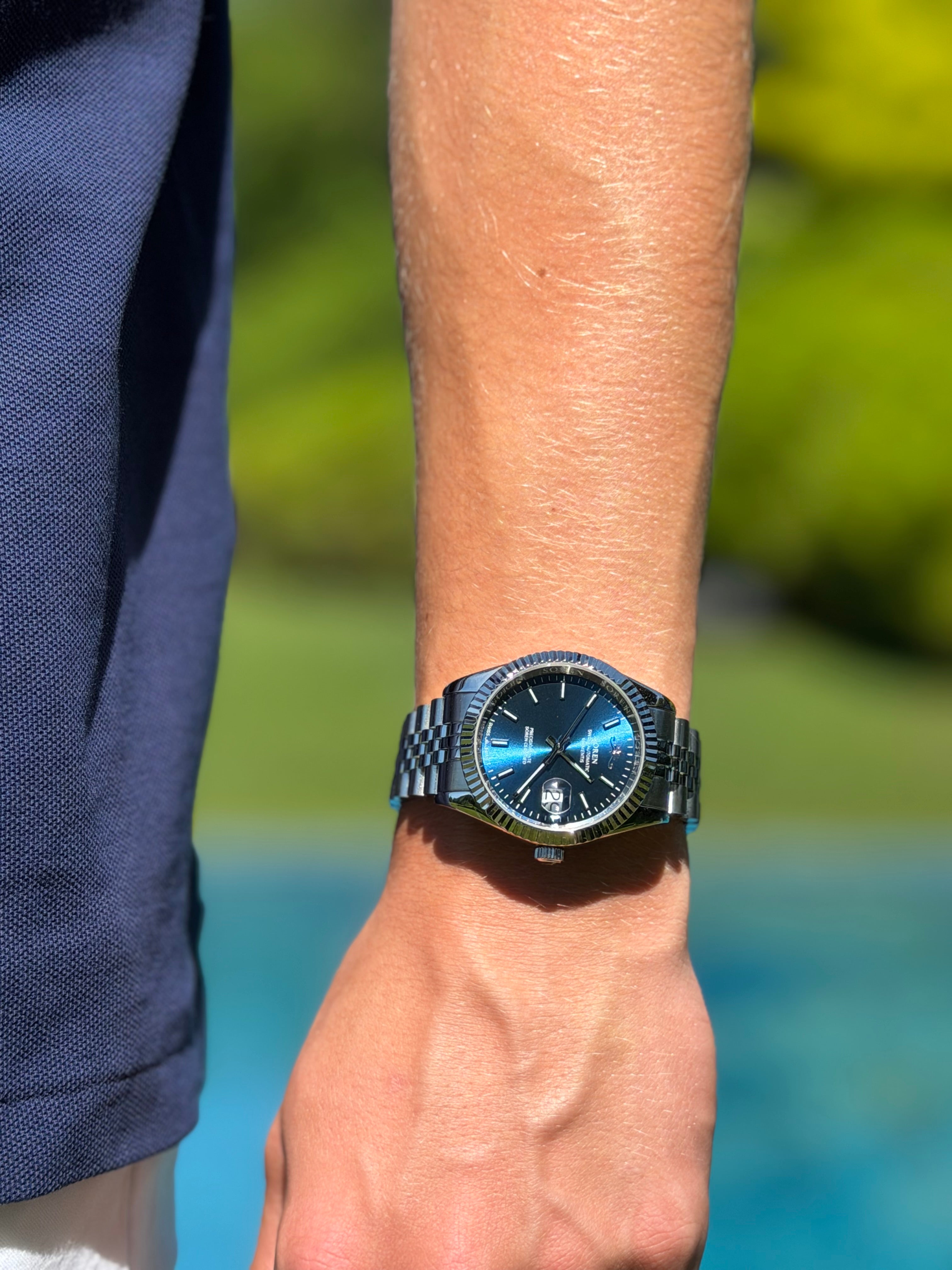 Soren Momentis Blue wrist shot — jubilee bracelet detail
