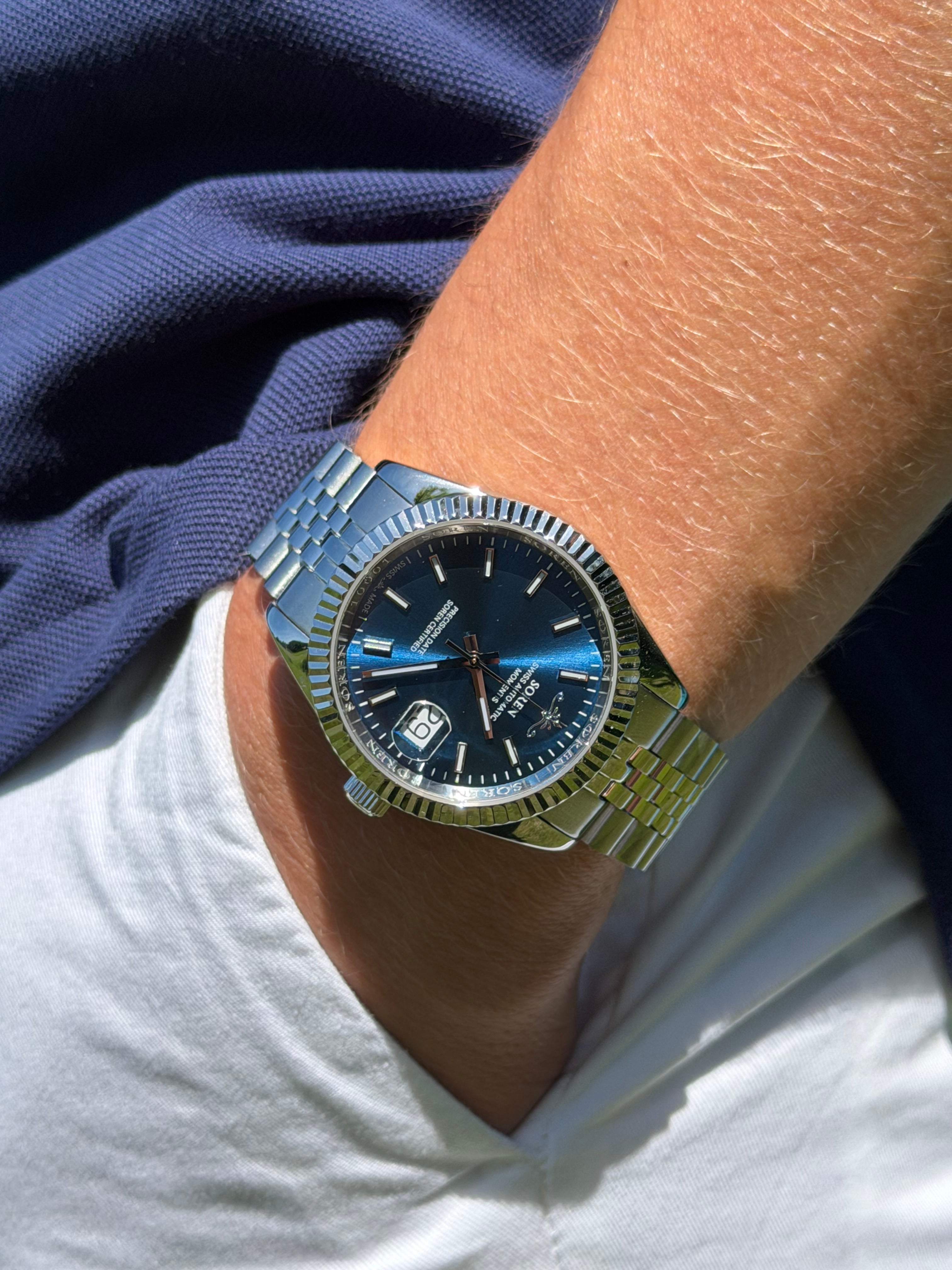 Soren Momentis Blue on wrist — Swiss Made automatic, jubilee bracelet
